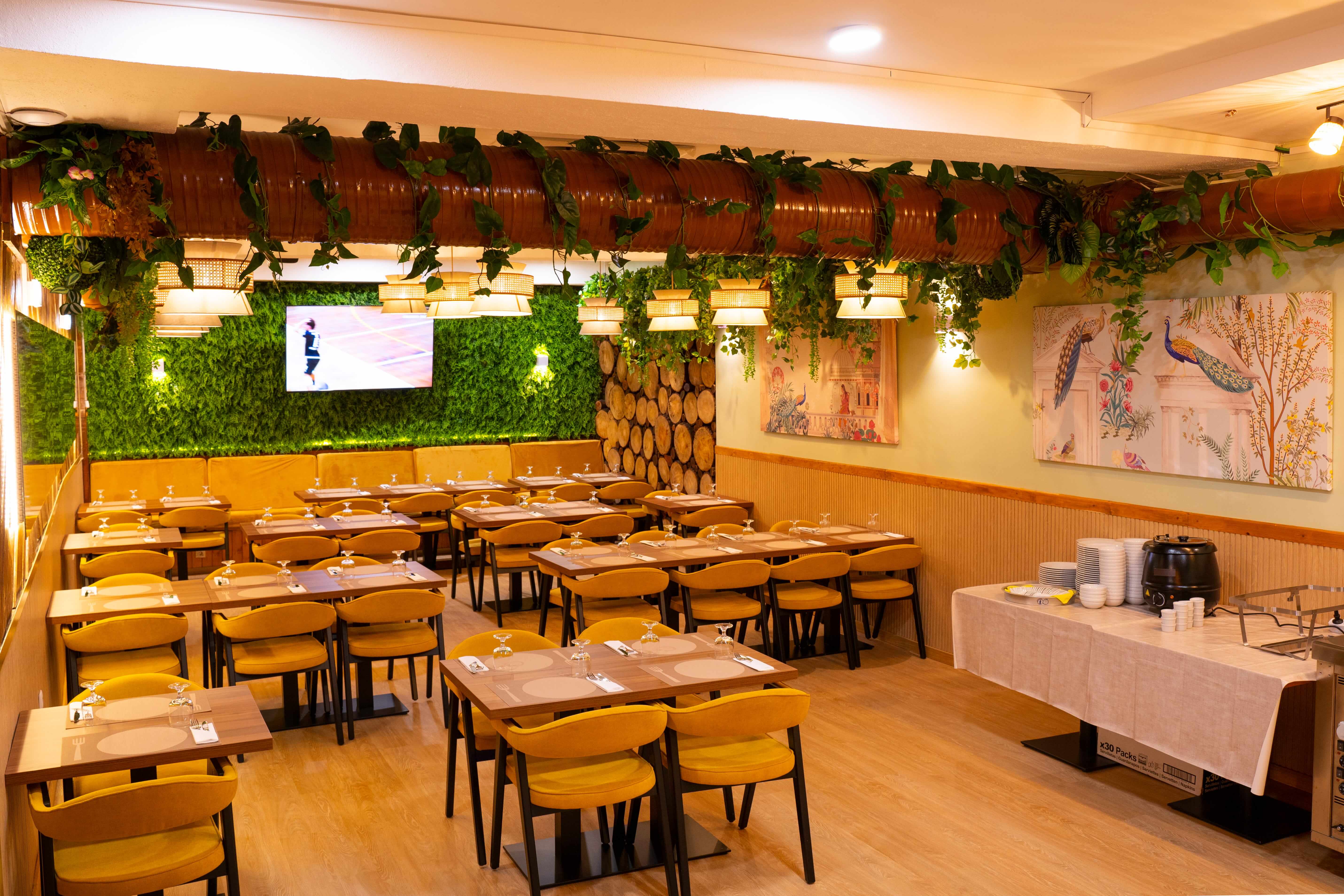 Second dining area with peacock artwork